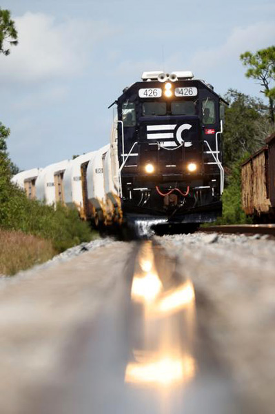 The train carrying 10 segments for the twin solid rocket boosters that will fly on the Artemis 2 mission arrives at NASA's Kennedy Space Center in Florida...on September 25, 2023.