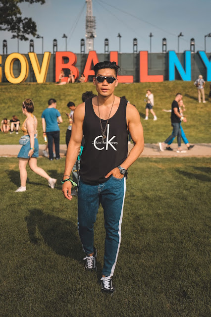 Leo Chan wearing Calvin Klein Tank Top, Vans Sneakers