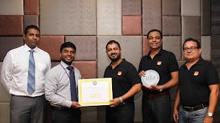 Saif Yusoof, Managing Director, EFL Sri Lanka (R) receives the LEED Gold certificate from Aazim Nafaiz, Director Carbon Solutionz. Also in the picture are (L-R) Nanda Abeysekera (Associate – Carbon Solutionz), Jagath Pathirana (CEO/Director - EFL Sri Lanka) and Shiran Dias (General Manager - HR & Administration - EFL Sri Lanka)