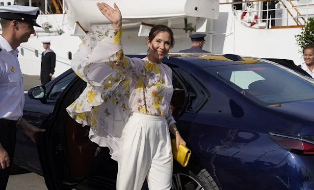 Crown Princess Mary wore a new cape-back floral-print silk-georgette blouse by Giambattista Valli. Rebekka Notkin