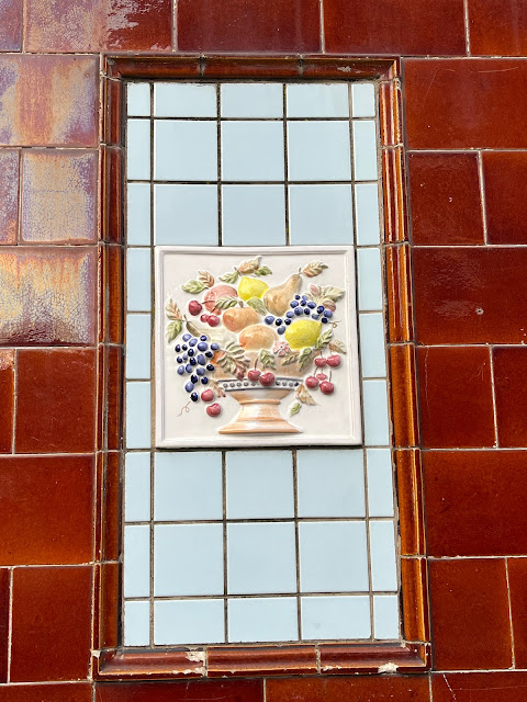 Tiling on the Old Parr's Head pub, Islington, North London, N1