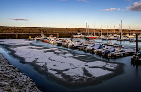 Photo of patches of snow and ice at Maryport Marina (Ravensdale is on the far end of the second pontoon)