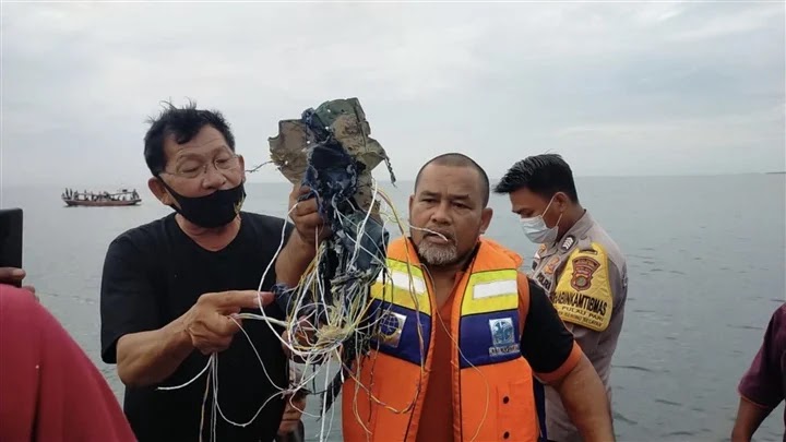 The first pictures of the wreckage of the crashed Indonesian plane