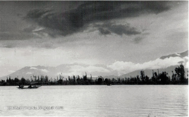 Vintage photo postcard view of sunset on the Dal Lake, Srinagar Kashmir.