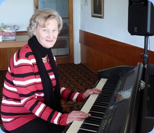 Eileen France playing the Clavinova. Photo courtesy of Dennis Lyons.