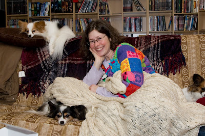 Beth and the Papillons enjoy a blanket from John's parents