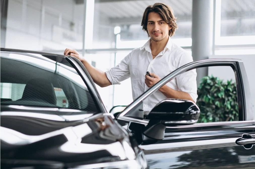 man with car