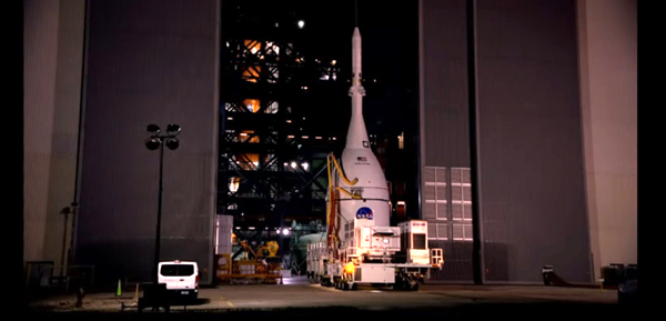 With the Space Launch System rocket visible inside, the Orion Artemis 1 capsule is about to enter the Vehicle Assembly Building at NASA's Kennedy Space Center in Florida...on October 19, 2021.