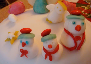 Christmas Cake (decorated with marzipan angels, snowmen, wisemen and presents)