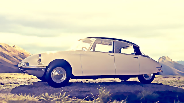 A Citroen DS19 sedan in a mountain area. Image by George Cosmos Wagner