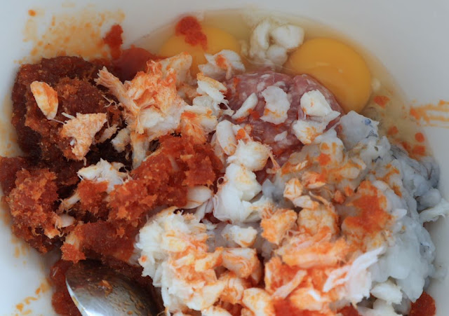 bun rieu - the rieu mixture made with crab, pork, shrimp