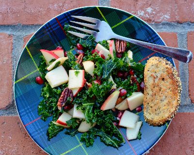 Festive Kale Salad with Apple & Pomegranate, another seasonal salad ♥ KitchenParade.com, a burst of color, texture and flavor for winter holiday meals.