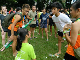 An orientation programme for freshmen of a university in Singapore drew flak after a picture went viral online, showing a male student spitting water at a female undergraduate.