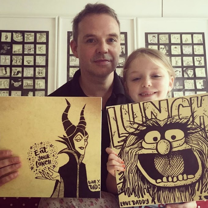 Un padre intenta que su hija coma el almuerzo haciéndole dibujos