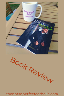 picture of book and coffee cup on an outdoor table