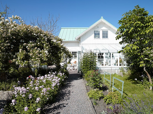 Exterior of a 1920s cottage garden sun room