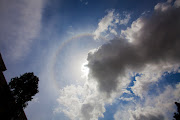 Labels: circular rainbow, clouds, rainbow