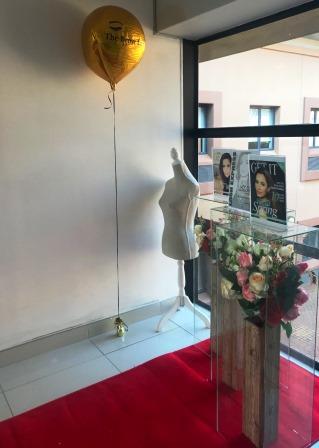 The Brow Bar entrance with balloon and flower arrangement - Clearwater