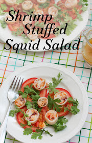 Food Lust People Love: Spicy shrimp stuffed squid salad says it all. Shrimp, chili peppers, garlic and cheese are stuffed into clean squid and baked! Once sliced, these beauties make a tasty colorful addition to a fresh tomato salad. This salad looks fancy, if you have special guests that need impressing, but it’s really quite easy to make.
