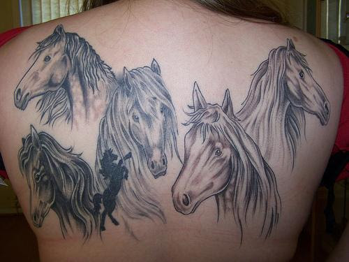 Five horse back piece tattoo
