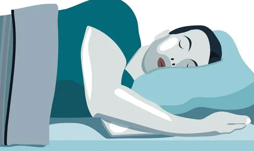 Man sleeping with head on pillow, bed and mattress