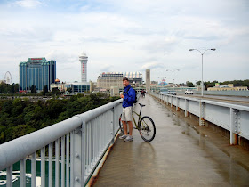 Crossing the Rainbow Bridge from America to Canada with our bikes while visiting the Niagara Falls Crossing the Rainbow Bridge from America to Canada with our bikes while visiting the Niagara Falls