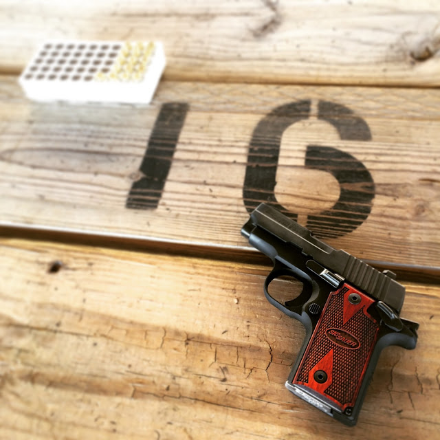 Caroline's Cues | Worth a shot at Heartland Shooting Park - Sig Sauer P238