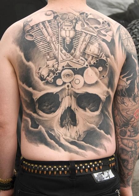 Black grey big skull with various mechanisms tattoo on back