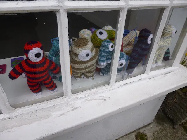 One-eyed crocheted creatures in Brighton UK