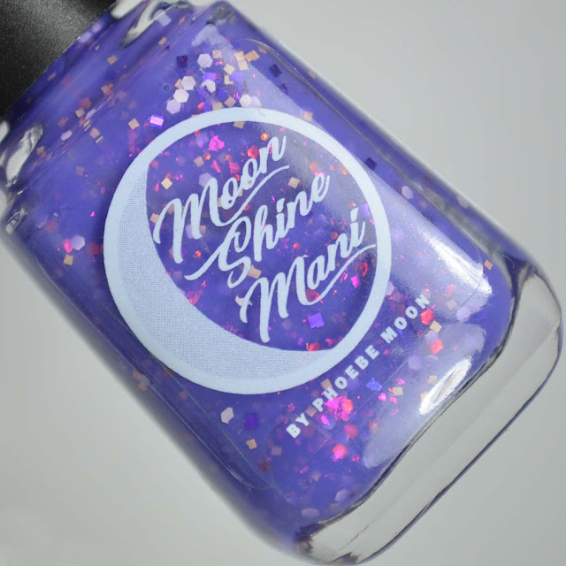 purple nail polish in a bottle