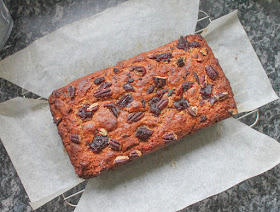 Food Lust People Love: Made with jellied sauce, this cranberry pecan quick bread is full of tart cranberry flavor, rich nutty bits with just enough sweetness to be perfect with a cup of hot tea or coffee. The original recipe called for whole berry sauce but in our family it wouldn’t be Thanksgiving or Christmas without the jiggly slices, served straight from the can. In my adapted recipe, you need the moisture of the jellied cranberry sauce to balance the added oat bran.