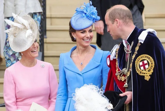 Kate Middleton wore a sky blue coat by Emilia Wickstead. The Countess of Wessex wore a baby pink bell-sleeve wool and silk blend dress