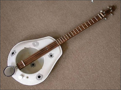 Unusual Guitar Design Seen On www.coolpicturegallery.net