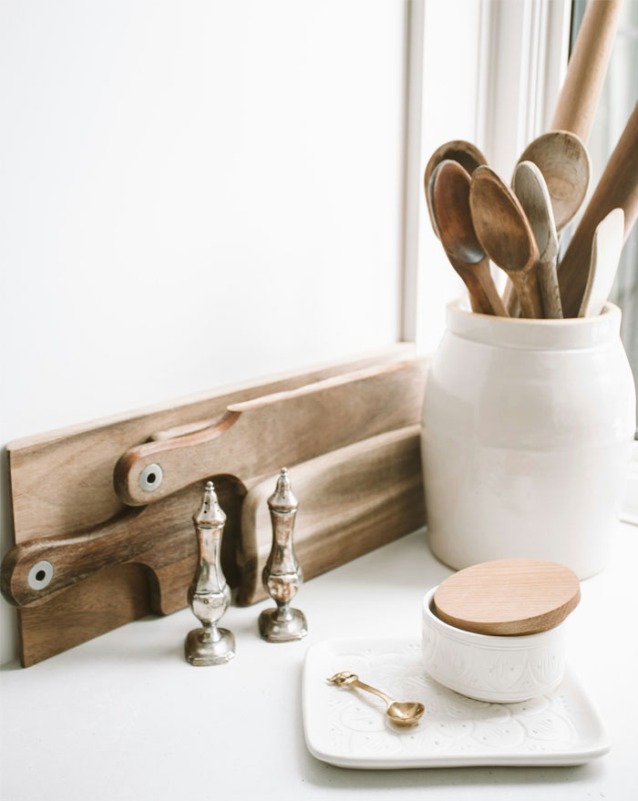 Kitchen counter with crock of wood spoons