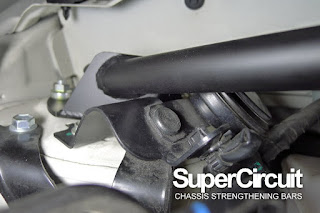 RH side of the SUPERCIRCUIT Perodua Axia Front Strut Bar with the horn bracket relocated.