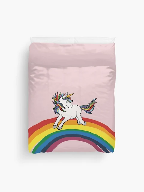Unicorn on rainbow duvet cover.