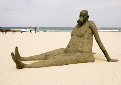 Slip, slop, slap Sculpture near sea