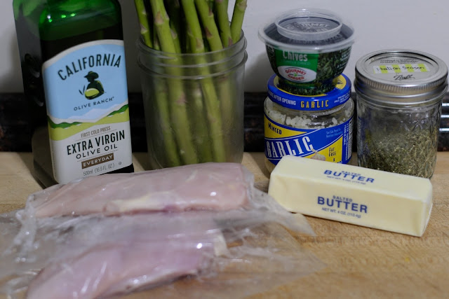 The ingredients needed to make the garlic and herb chicken with asparagus recipe