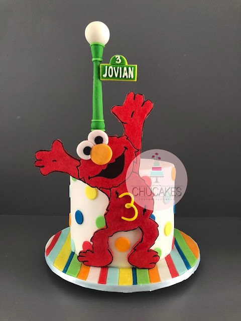 sesame street elmo cake fondant chucakes lamp post polka dots colurful singapore