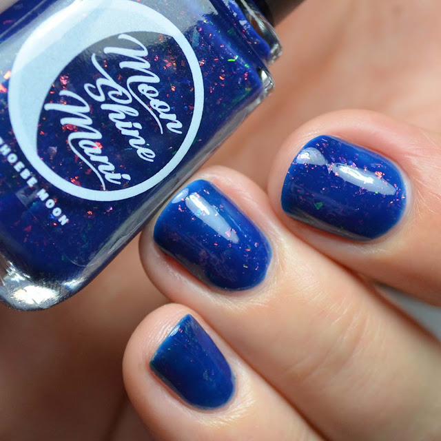 blue crelly nail polish with chameleon flakies