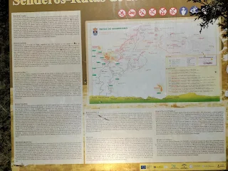 Info board about hiking trails around Cómpeta