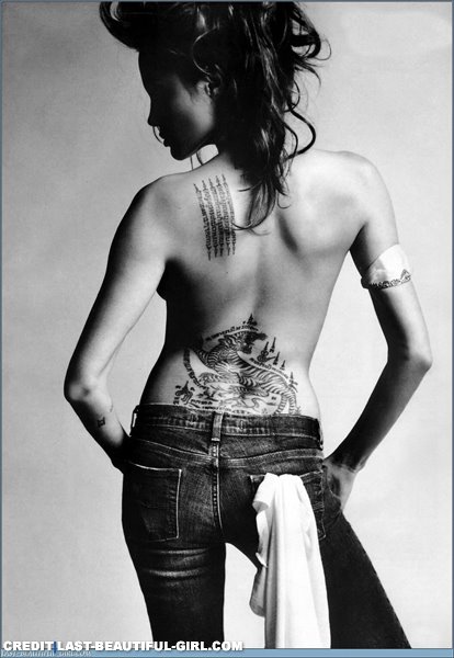 foto tatuaje espalda victoria beckham. tatuajes estrellas espalda. tatuaje estrellas. tatuajes de estrellas de