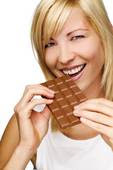 woman eating chocolate