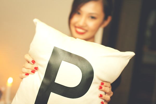  brought for her these custommade pillows that had the letters P A M 