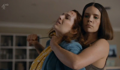 Hester (Sonya Cassidy) chokes Laura Hawkins (Katherine Parkinson)