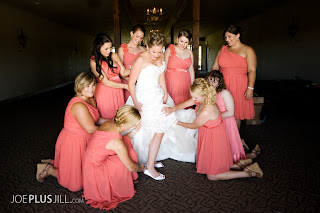 Aleah surrounded by her bridesmaids at Hidden Meadows