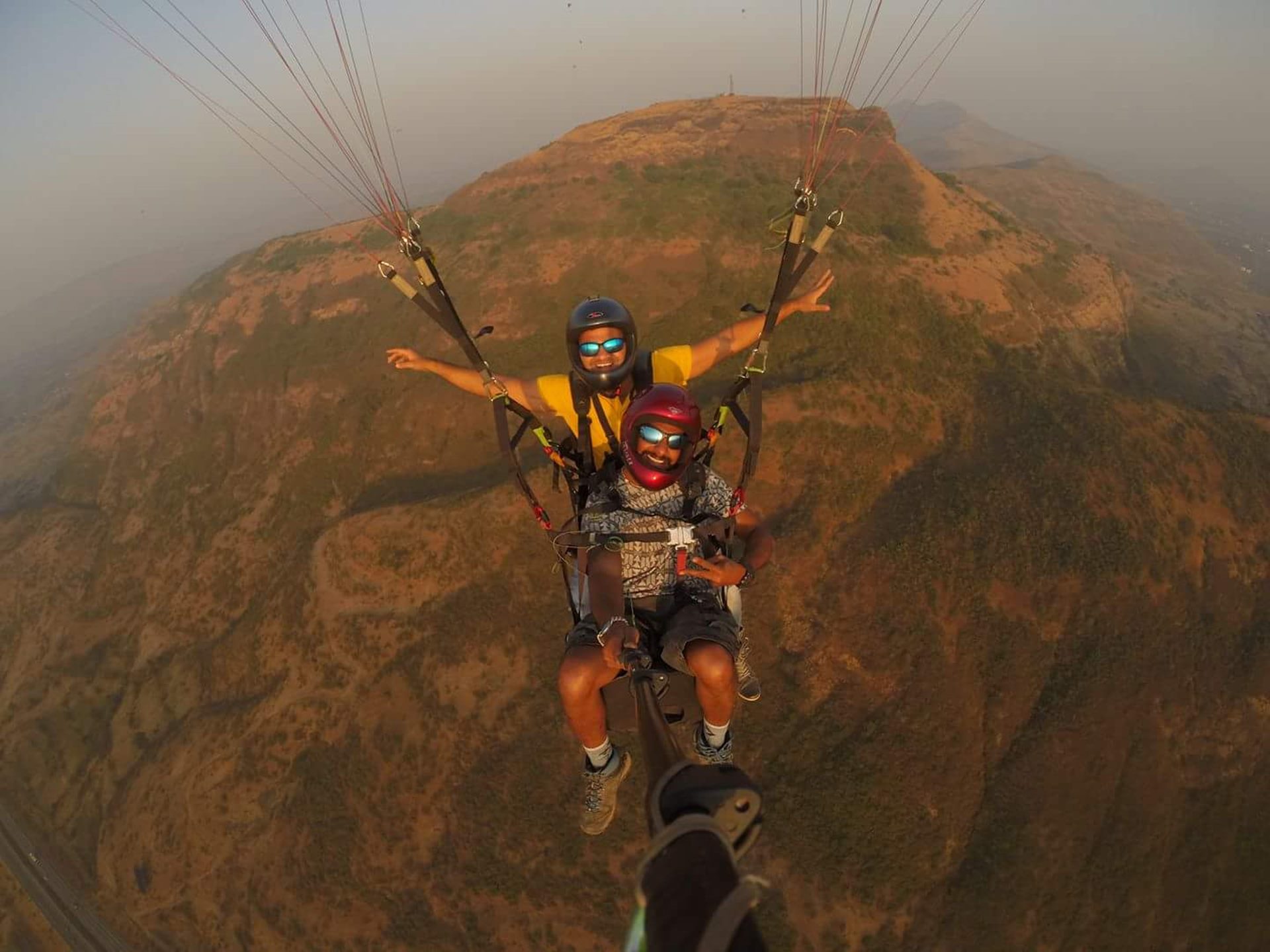 Two man paragliding in Kamshet is the clearest trip of your life, partner in crime returning from paragliding in Kamshet