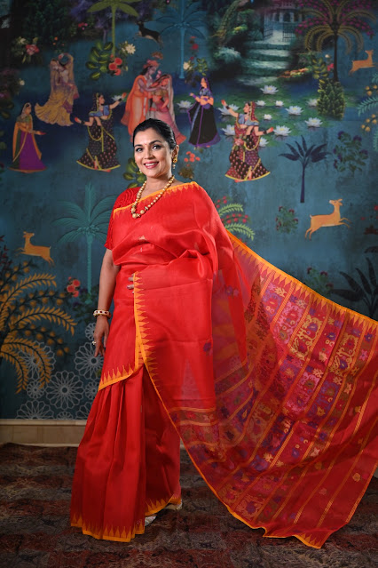 Red silk Rani phee saree from Manipur with a temple border and jamdani weave.