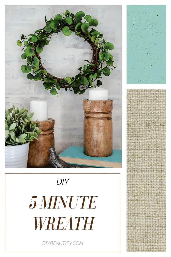 greenery wreath on wall, wood candle holders