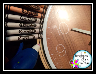 Gluing the crayons onto the support wall of a crayon clock